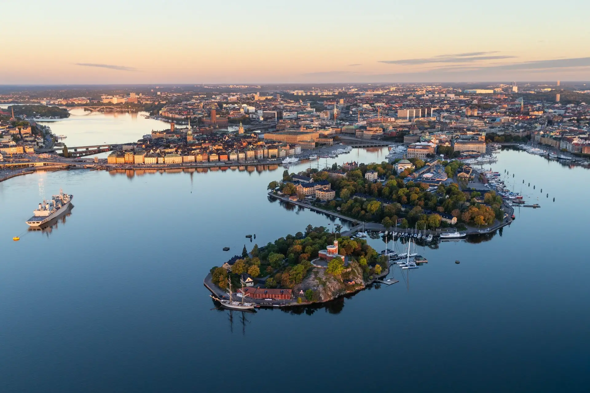 Aerial view of Stockholm city, Skeppsholmen and Kastellholmen at golden hour